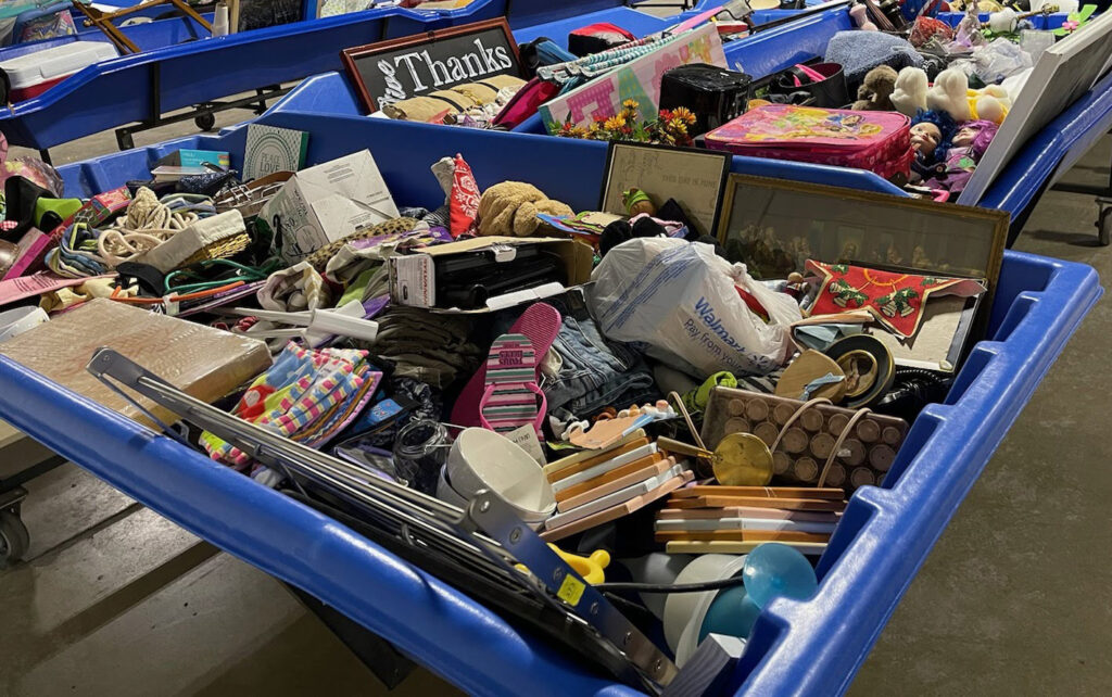 A big blue bin full of goods for sale, located at the Goodwill of the Great Plains Outlet Center in Sioux City.